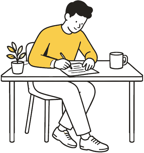 A person at a table filling in a paper form