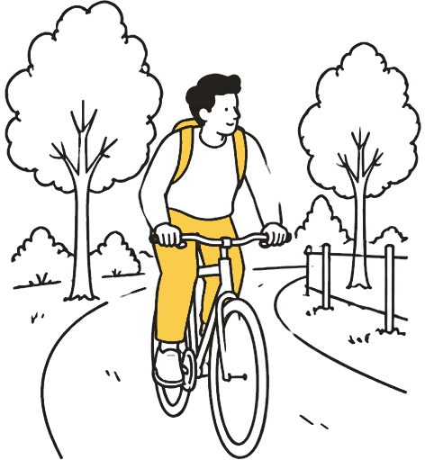 A person cycling along a tree-lined trail